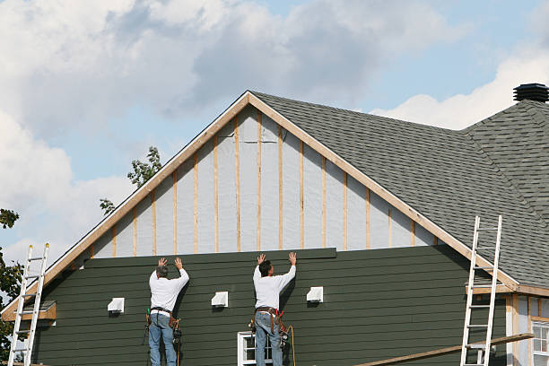Professional Siding Installation technician working in Brighton, TN